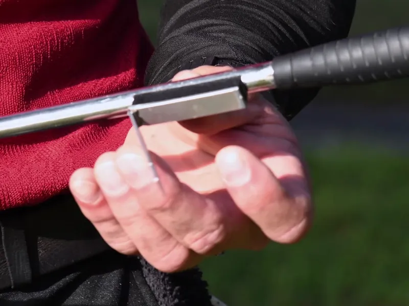 Close-up of the Grip Keeper kickstand on a club shaft